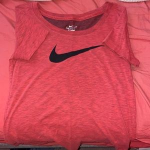 Orange and black nike t-shirt, size xs but fits like a small.